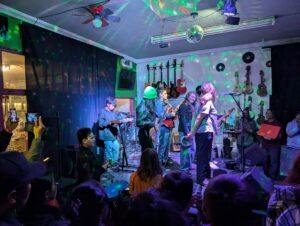 Kavod middle schoolers from the after school rock band, “Red Cards” performing at Humble Heart in Ocean Beach, a thrift store turned music venue!
