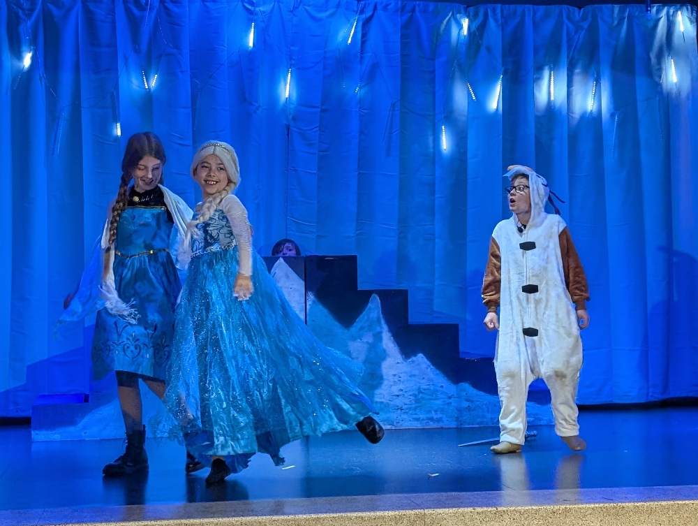 Children from Kavod Charter School wearing costumes from Frozen